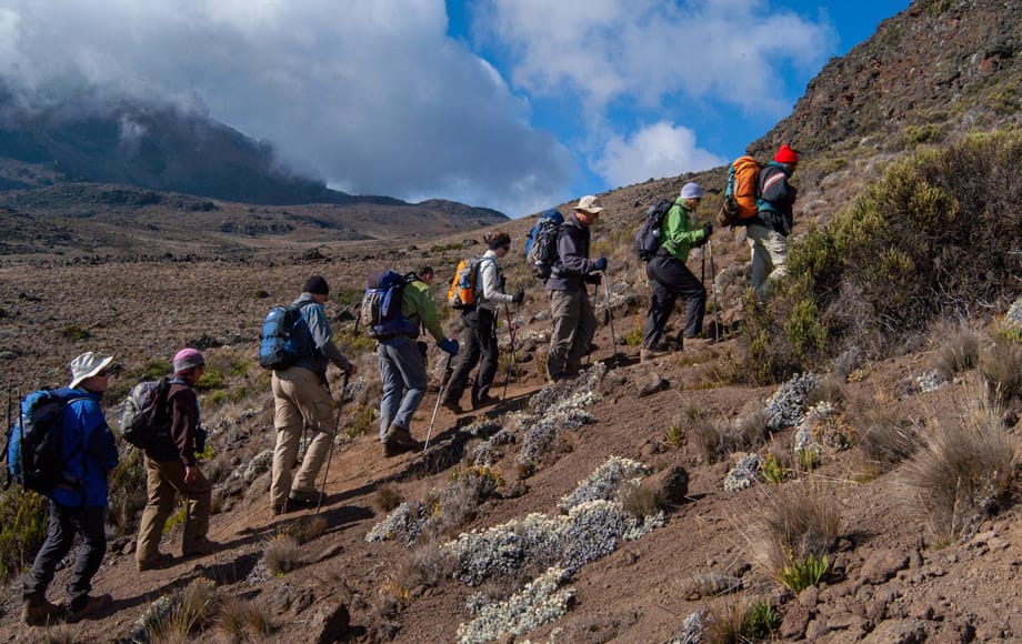 Polish-speaking mountain guide with trekkers on the Machame Route to Kilimanjaro